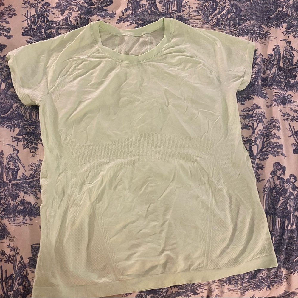 Athleta short sleeve athletic shirt light green estimated size L or XL